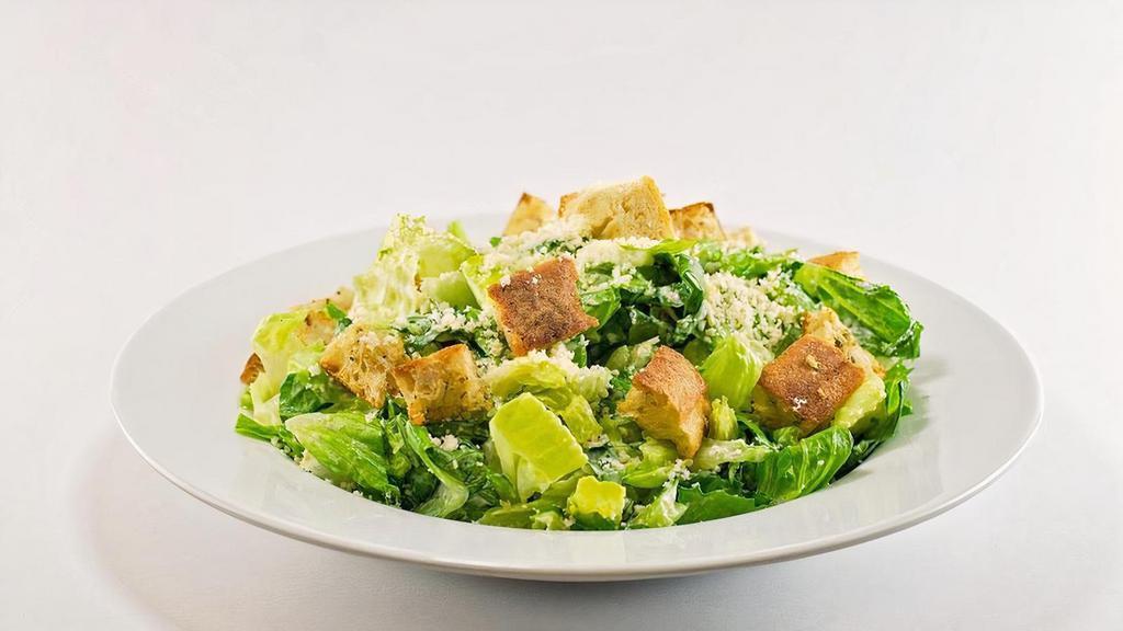 Caesar Salad · Fresh romaine lettuce, shaved Parmesan cheese, croutons served with Caesar dressing.