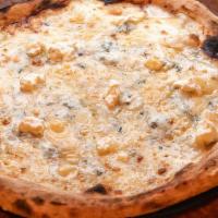 Four Formaggi Pizza · Fior di latte mozzarella, gorgonzola cheese, sweet fontina cheese, and ricotta cheese.