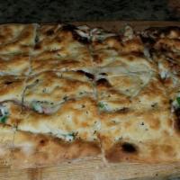 Ciccio Stuffed Pizza · Stuffed Pizza with Mozzarella, Smoked Scamorza, Prosciutto di Parma , Arugola.