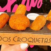 6 | Croqueta Flight™ + Sauces · Mix and match 6 craft croquetas & sauces with your very own Croqueta Flight™. If You’re doub...