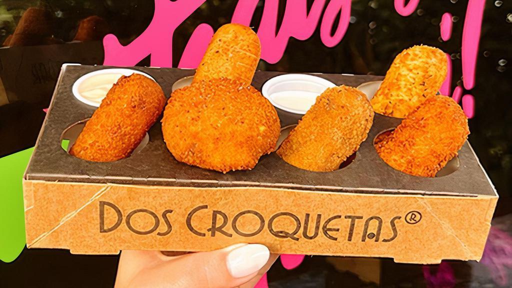 Croquetas - 6 | Croqueta Flight™ + Sauces · Mix and match 6 craft croquetas & sauces with your very own Croqueta Flight™. If You’re doubling up let us know which croquetas you'd like in the special instructions box below!