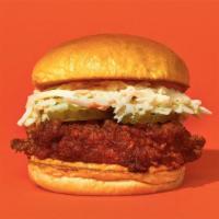 Nashville Hot · Our signature fried chicken made spicy and served on a bun, topped with coleslaw, and spicy ...
