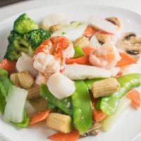 Seafood Delight · A delightful combination of jumbo shrimp, lobster, scallops, crab meat, sautéed w. Chinese v...