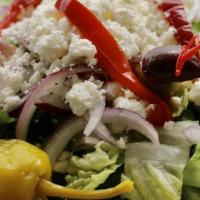 Greek Salad · Our most popular salad; fresh romaine, tomatoes, onions, pepperoncini, sliced pimento, kalam...