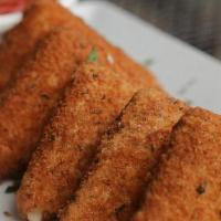 Fried Mozzarella · 5 Mozzarella triangles breaded and fried to delicious cheesy perfection and served with a si...