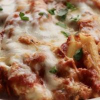 Baked Ziti · Penne noodles tossed with Ricotta Cheese, topped with Mozzarella, and Baked to Perfection in...