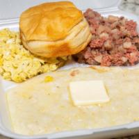 Corned Beef Hash · Served with grits, eggs and a biscuit.
