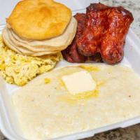 Sausage · Served with grits eggs and a biscuit.