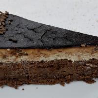 Chocolate Temptation · Layers of chocolate cake made with cocoa from Ecuador, filled with chocolate and hazelnut cr...