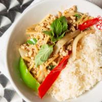 Basil Chicken  · Famous house basil sauce with ground chicken over rice, onion, bell pepper, bamboo shoot.