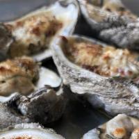 Chargrilled Garlic Parmesan · Fresh oysters chargrilled in garlic butter sauce topped with parmesan cheese.