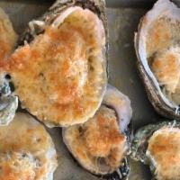 Rockefeller Oysters · creamed spinach, bread crumbs, bacon, topped with parmesan cheese