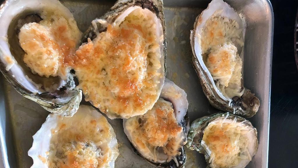 Rockefeller Oysters · creamed spinach, bread crumbs, bacon, topped with parmesan cheese