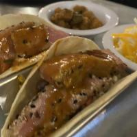 2 Tacos · Fish, shrimp or tuna cabbage, pico de gallo and peruvian sauce.