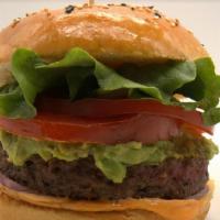 The Miles-Our Impossible Avocado Burger · We season this delicious, plant-based burger to perfection, top with red onion, creamy avoca...