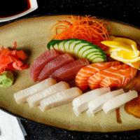 Sashimi Regular (12 Pieces) · Chef choice only.
Served with soup or salad.