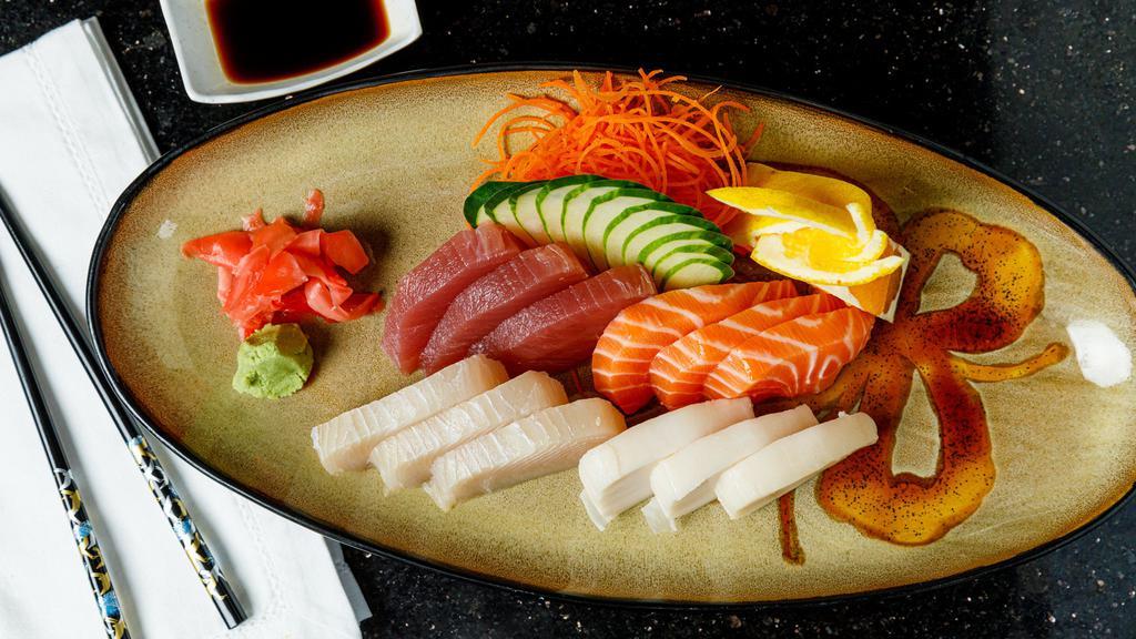 Sashimi Regular (12 Pieces) · Chef choice only.
Served with soup or salad.