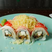 Dolphin Roll · Eel, cream cheese, cucumber, and topped with crab, tempura flakes, and spicy mayonnaise. Con...