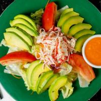 Avocado Salad · Green salad topped with avocado, crab, shrimp, masago, mayonnaise, and ginger dressing.