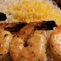 Shrimp Large Plate · 1 Skewer of Shrimp Kabob (Marinated Shrimp). Served with your choice of Grain or Salad and S...