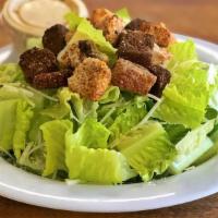 Caesar Salad · Crisp romaine tossed with Caesar dressing, croutons, and shredded parmesan cheese.