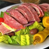 Antipasto Salad · Lettuce, tomato, onion, provolone cheese, ham, salami, capicolla, pepperoni, pepperoncini an...