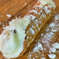 Cannoli · A fried shell of dough filled with a sweet, creamy filling of ricotta cheese, vanilla, and c...
