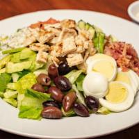 Cobb Salad · Lettuce, Chicken Breast, Bacon, Eggs, Avocado, Tomatoes, Blue Cheese, Olives, Cucumbers.