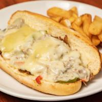 Philly Cheesesteak Sandwich · Thinly Sliced Beef or Chicken, Peppers, Onions, Mushroom, Provolone Cheese, Hoagie Roll.