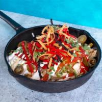 Cantina Skillet · rice, queso blanco, grilled peppers and onions, jalapeños, tortilla strips, cilantro, lime c...