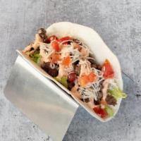 Seasoned Ground Beef Taco · seasoned ground beef, lettuce, tomato, jack cheese, spicy ranch
