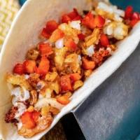 Low Country Boil Taco · grilled shrimp, chorizo, grilled onions, roasted corn, tater tots, spicy ranch, diced red pe...