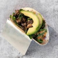 Kale & Mushroom Taco · sautéed kale and mushrooms, sliced avocado, grilled onions, baja slaw, ancho lime vinaigrette