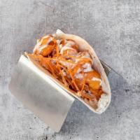 Buffalo Shrimp Taco · buffalo fried shrimp, baja slaw, carrots, blue cheese crumbles, ranch