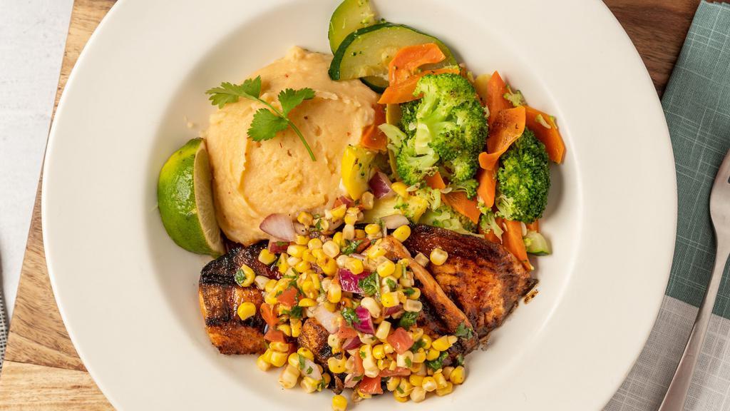 Ancho Honey Glazed Salmon · Grilled salmon with ancho honey, topped with roasted corn salsa with your choice of mashed potatoes and veggies or black beans and rice.