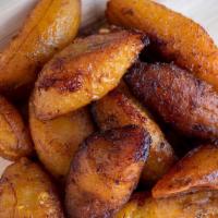 Maduros · Deep-fried sweet plantains.
