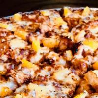 Bbq Pizza · Grilled chicken, red onions, bacon, BBQ sauce and extra cheese.