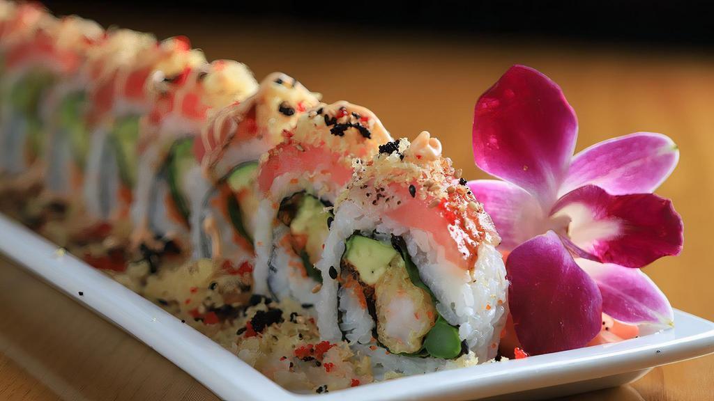 Funky Monkey Roll · 10 pieces roll with shrimp tempura, asparagus, lettuce, masago, spicy mayo topped with tuna tataki, tempura flakes, scallions. Served with soy, spicy mayo and eel sauce.