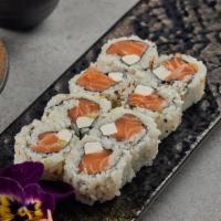 Jb Roll · 8 pieces roll with salmon, cream cheese, and scallions. Served with soy sauce.