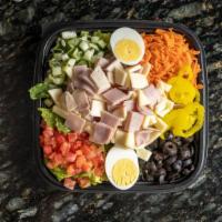 Chef Salad · Lettuce, tomatoes, pickles, onions, ham, turkey, boiled egg, provolone.