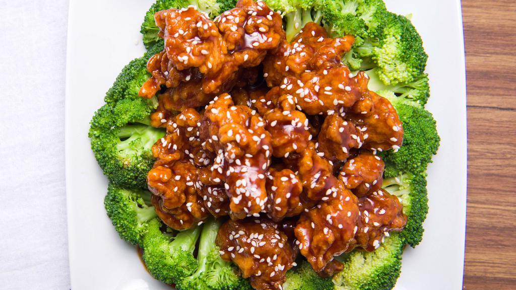 Sesame Chicken/ 芝麻鸡 · Deep-fried Chunks of Chicken in Sesame Brown Sauce.