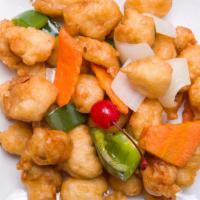 Sweet & Sour Chicken · Battered and fried white meat chicken served with pineapple and sweet and sour sauce.