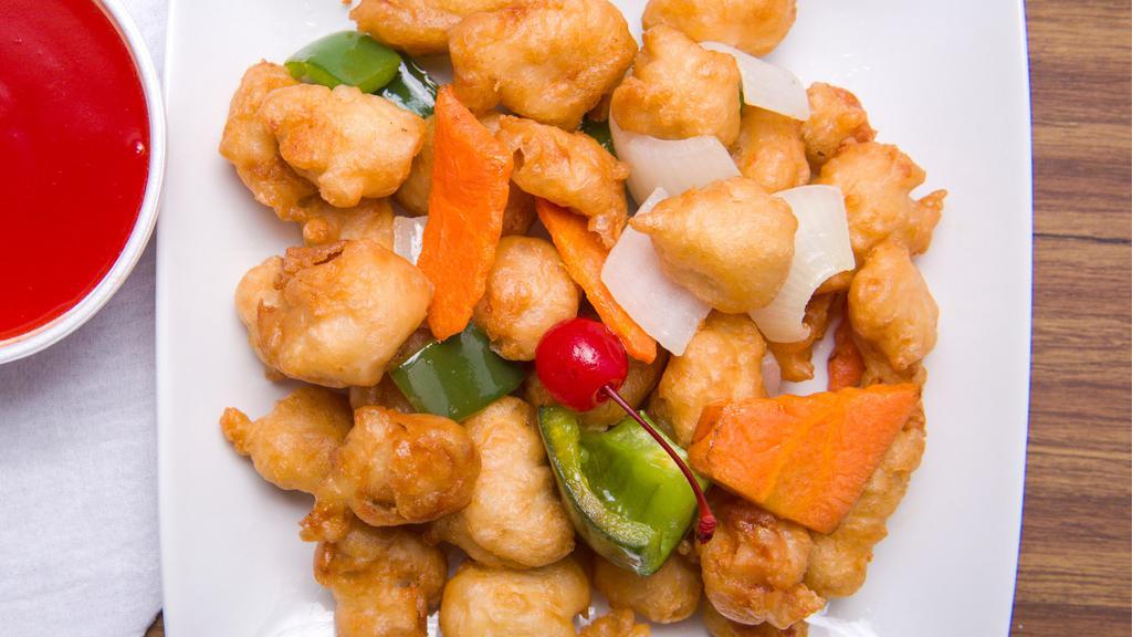 Sweet & Sour Chicken · Battered and fried white meat chicken served with pineapple and sweet and sour sauce.