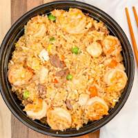 House Fried Rice · Beef, chicken and shrimp.