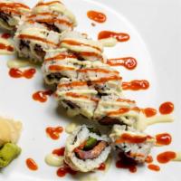 Fuego Roll · In: Salmon, Tuna, Fried Onion, and Jalapeno
Out: Wasabi Mayo, Green Onion and Sriracha