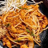 Chicken Pad Thai Noodle · Thin flat rice noodle stir fry with tamarind sauce, and egg. Topped with ground peanut, lime...