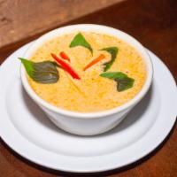 Red Curry · Choice of protein cooked with red curry sauce, bamboo shoots, zucchini, bell pepper and basi...