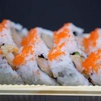 Shrimp Tempura Roll · Tempura - battered shrimp, cucumber, and Hass avocado in a nori roll. Topped with masago cav...