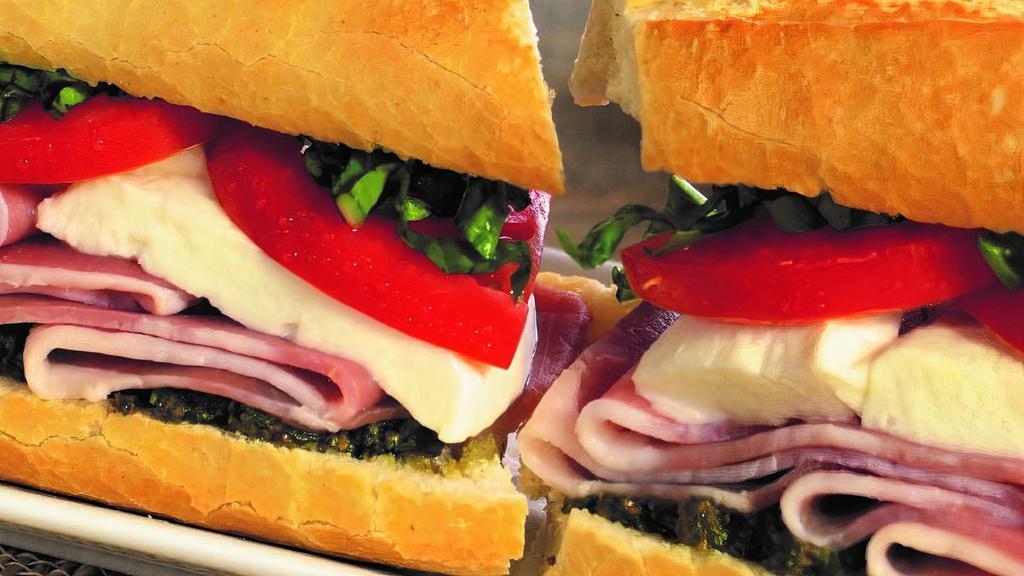 Prosciutto Sandwich · Fresh Mozzarella, tomatoes, fresh basil, basil pesto, extra virgin olive oil, and balsamic vinegar.