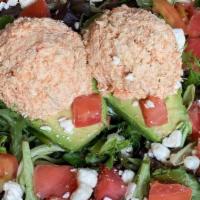 #27 Stuffed Avocado · w/ Feta, tomatoes, greens and your choice of either Tuna Salad or Chicken Salad.